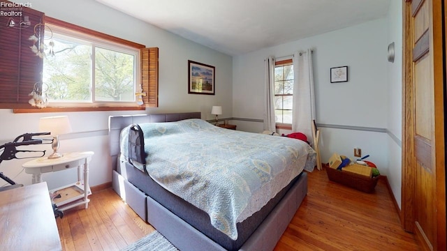 66 Hillcrest Dr, Willard, OH 44890 - bedroom featuring light wood finished floors and baseboards