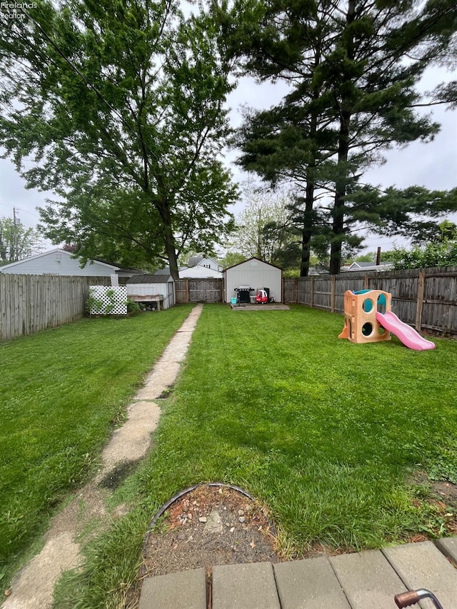 81 Melissa St, Tiffin, OH 44883 - view of yard with a storage shed and an outdoor structure
