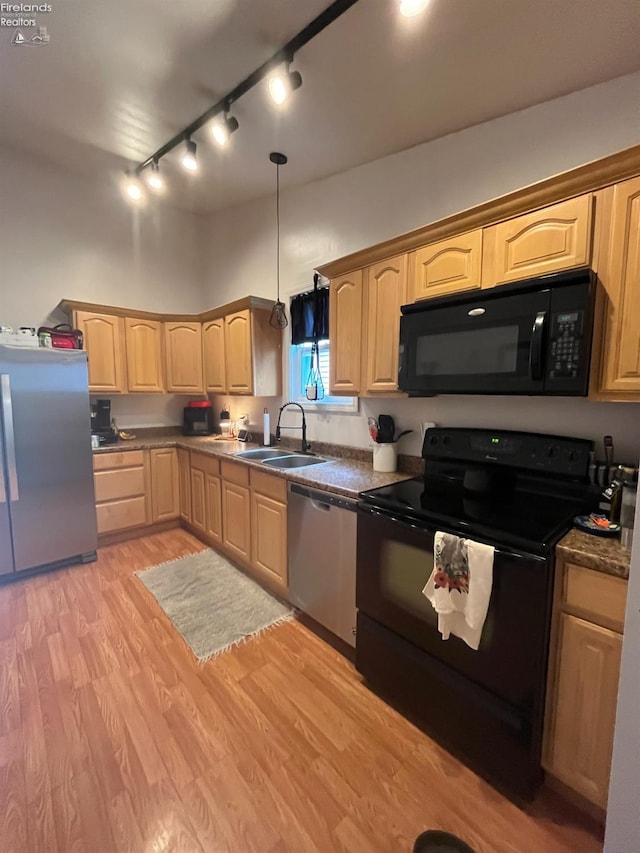 81 Melissa St, Tiffin, OH 44883 - kitchen featuring black appliances, a sink, light brown cabinetry, and track lighting