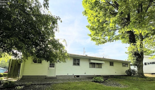 5 Old State Rd, Norwalk, OH 44857 - rear view of property with a yard and entry steps