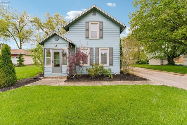 515 Berlin Rd, Huron, OH 44839 - view of front of home with a front lawn