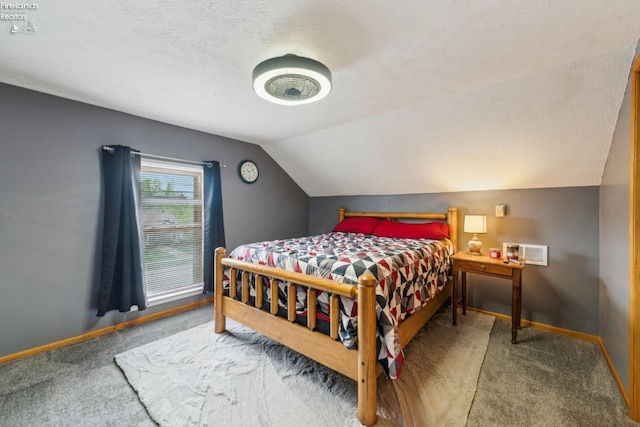 515 Berlin Rd, Huron, OH 44839 - carpeted bedroom featuring baseboards, vaulted ceiling, and a textured ceiling