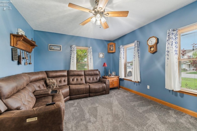 515 Berlin Rd, Huron, OH 44839 - carpeted living room featuring a ceiling fan and baseboards