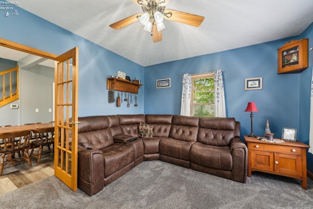 515 Berlin Rd, Huron, OH 44839 - living room featuring a ceiling fan and stairway
