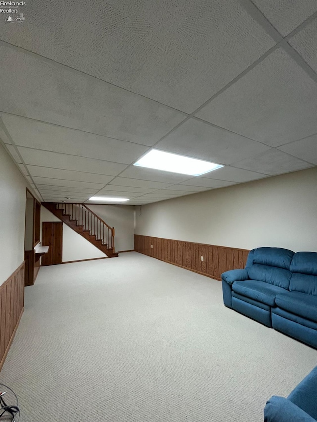 378 Lelar St, Tiffin, OH 44883 - finished below grade area featuring carpet floors, wood walls, a wainscoted wall, and a paneled ceiling