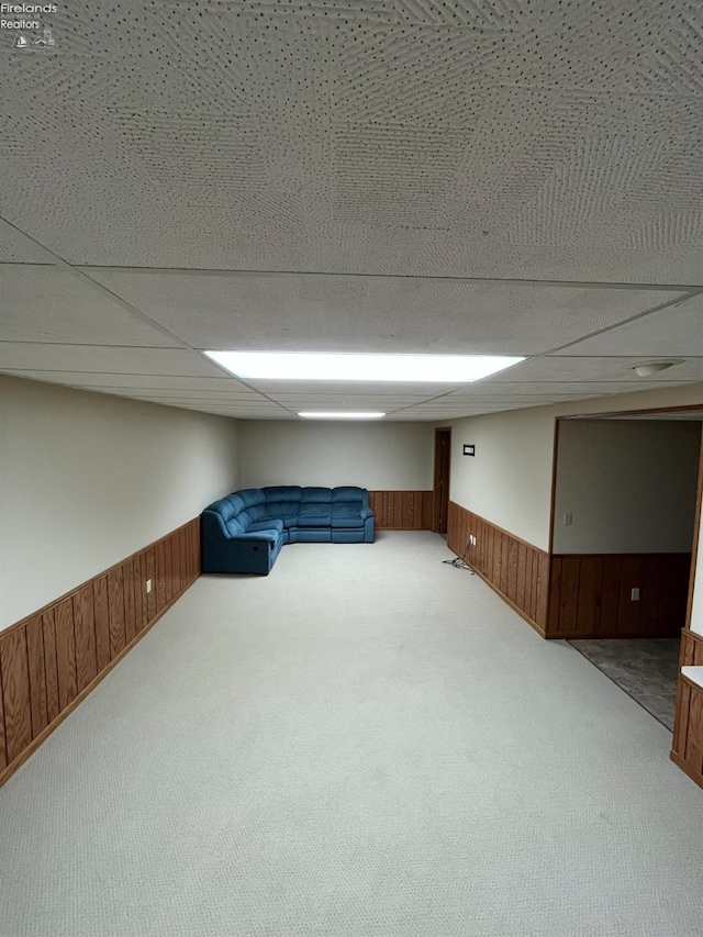 378 Lelar St, Tiffin, OH 44883 - finished basement featuring carpet flooring, wood walls, a wainscoted wall, and a drop ceiling