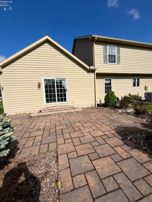 378 Lelar St, Tiffin, OH 44883 - back of house featuring a patio area and central AC unit