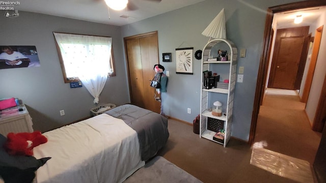 903 N Warpole, Upper Sandusky, OH 43351 - bedroom featuring carpet, a closet, ceiling fan, and baseboards