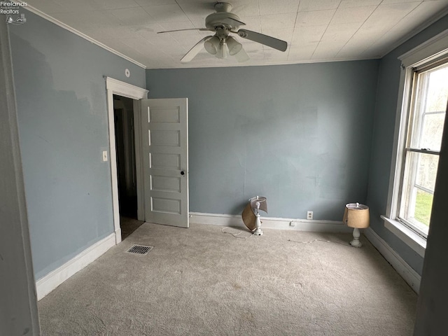 515 W Osborne St, Sandusky, OH 44870 - carpeted spare room with crown molding, a ceiling fan, and baseboards