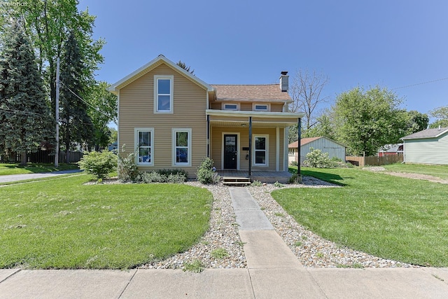 view of front of property featuring covered porch and a chimney