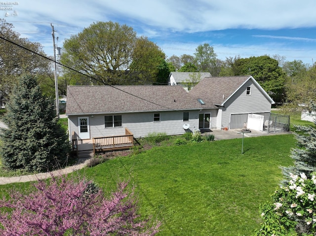 715 Cherry Ave, Lakeside, OH 43440 - back of house with a deck, a patio area, and a garage
