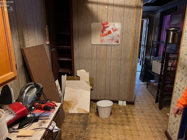 525 N Main St, Fostoria, OH 44830 - bathroom featuring wooden walls and tile patterned floors