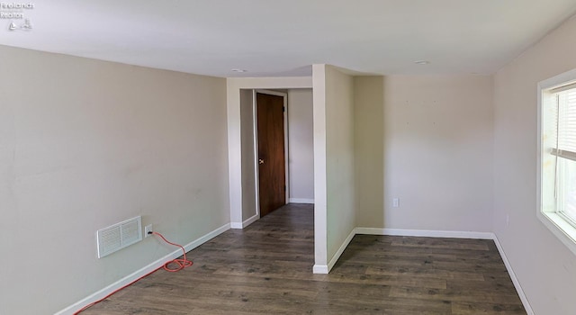 108 Spring St, Willard, OH 44890 - spare room with wood finished floors and baseboards