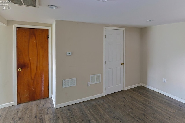 108 Spring St, Willard, OH 44890 - empty room with baseboards and wood finished floors