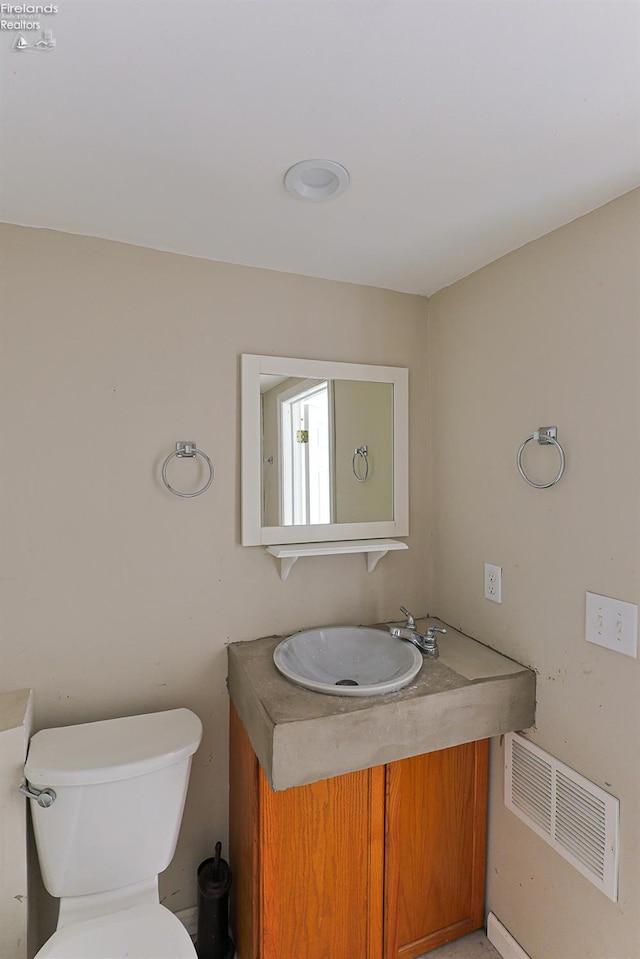 108 Spring St, Willard, OH 44890 - half bathroom with vanity and toilet
