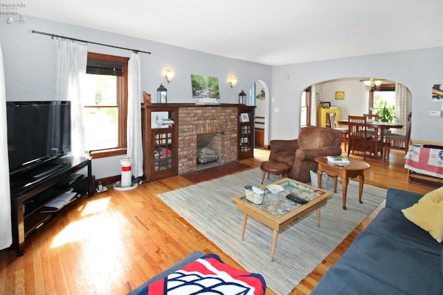 206 Lincoln Dr, Port Clinton, OH 43452 - living room with arched walkways and wood finished floors