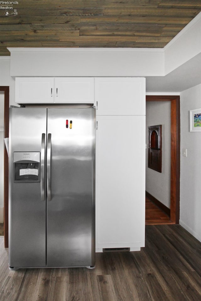 206 Lincoln Dr, Port Clinton, OH 43452 - kitchen with stainless steel fridge, baseboards, white cabinets, dark wood-style flooring, and wood ceiling