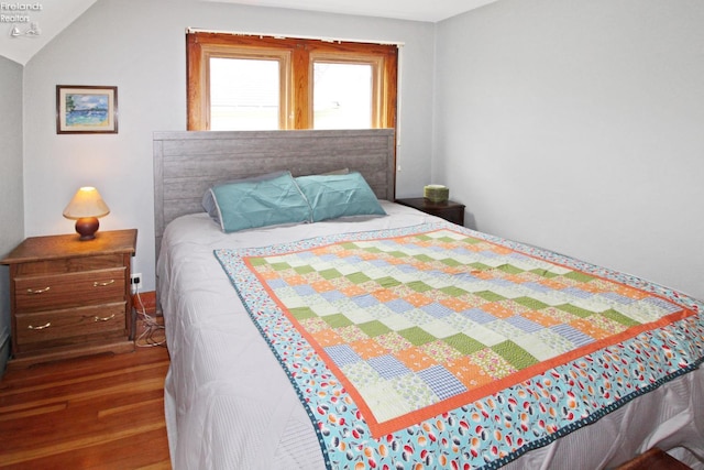 206 Lincoln Dr, Port Clinton, OH 43452 - bedroom with wood finished floors and vaulted ceiling