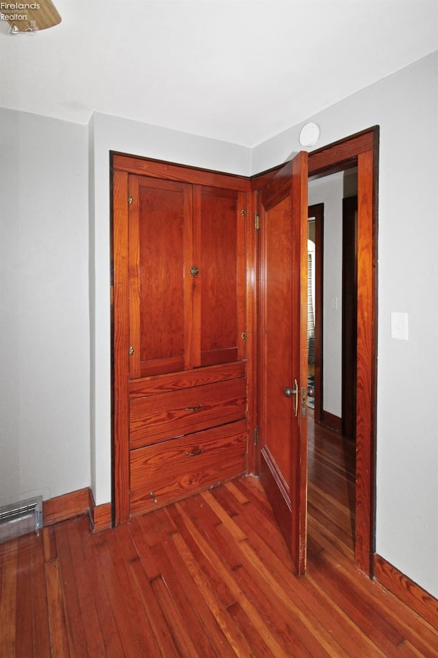 206 Lincoln Dr, Port Clinton, OH 43452 - hallway featuring hardwood / wood-style flooring and baseboards