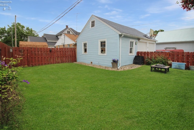 206 Lincoln Dr, Port Clinton, OH 43452 - rear view of house featuring roof with shingles