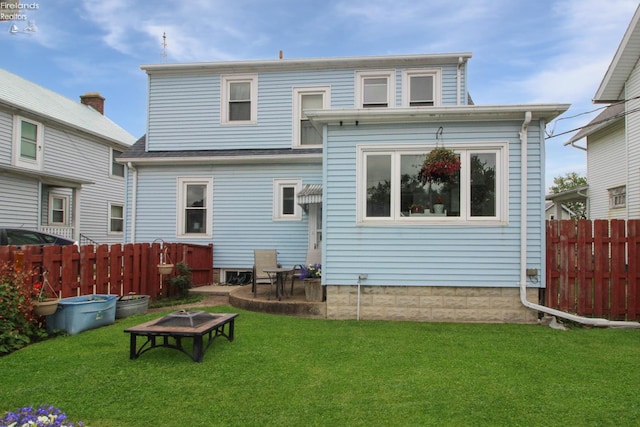206 Lincoln Dr, Port Clinton, OH 43452 - back of house with a fire pit