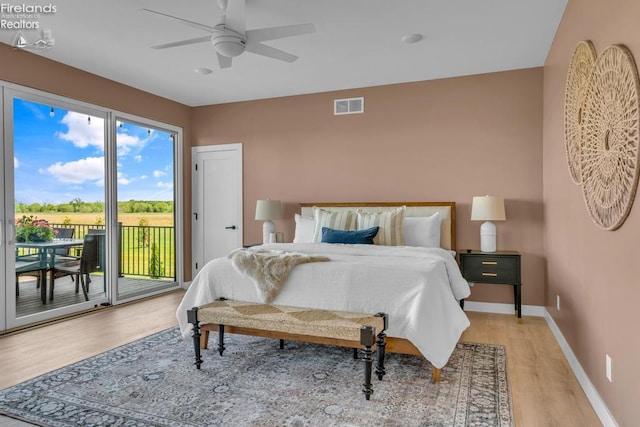 1861 N Opfer Lentz Rd, Martin, OH 43445 - bedroom featuring access to exterior, light wood-style flooring, baseboards, and a ceiling fan
