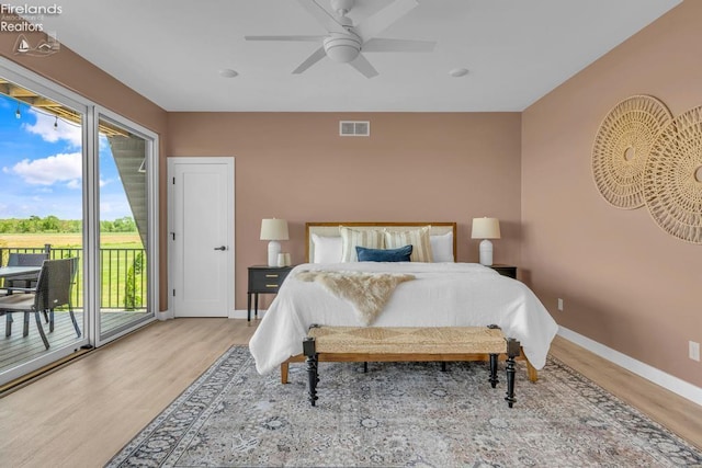 1861 N Opfer Lentz Rd, Martin, OH 43445 - bedroom featuring access to exterior, wood finished floors, baseboards, and ceiling fan