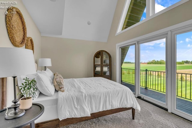 1861 N Opfer Lentz Rd, Martin, OH 43445 - bedroom featuring access to outside, high vaulted ceiling, and carpet floors