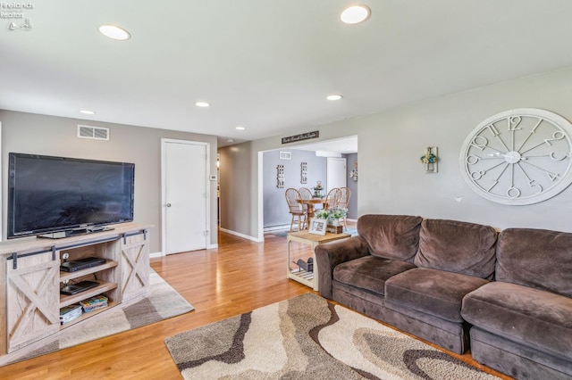 6518 W Township Road 112, Fostoria, OH 44830 - living area with wood finished floors, recessed lighting, and baseboards