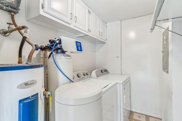 6518 W Township Road 112, Fostoria, OH 44830 - laundry area with washing machine and clothes dryer, light flooring, water heater, and cabinet space