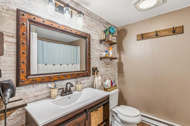 6518 W Township Road 112, Fostoria, OH 44830 - full bathroom with baseboard heating, toilet, and vanity