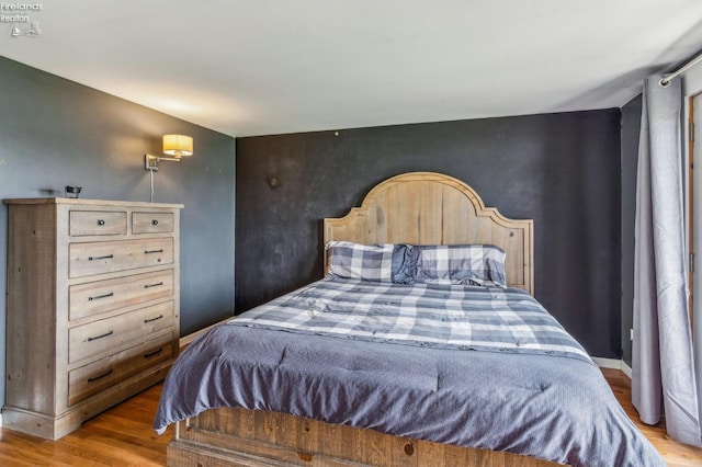 6518 W Township Road 112, Fostoria, OH 44830 - bedroom with wood finished floors