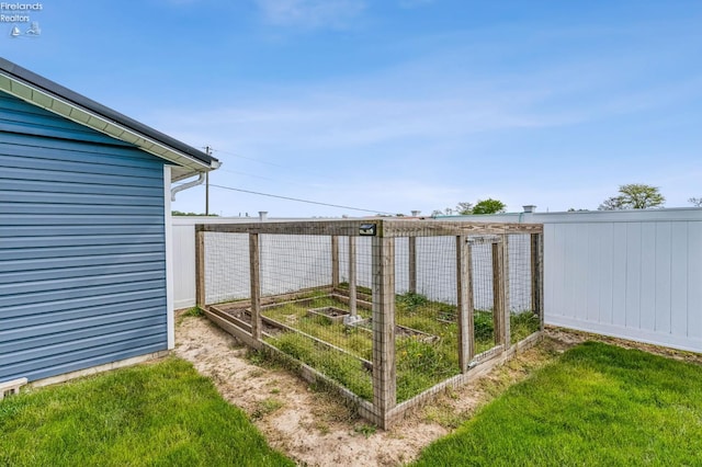 6518 W Township Road 112, Fostoria, OH 44830 - view of green lawn with a garden
