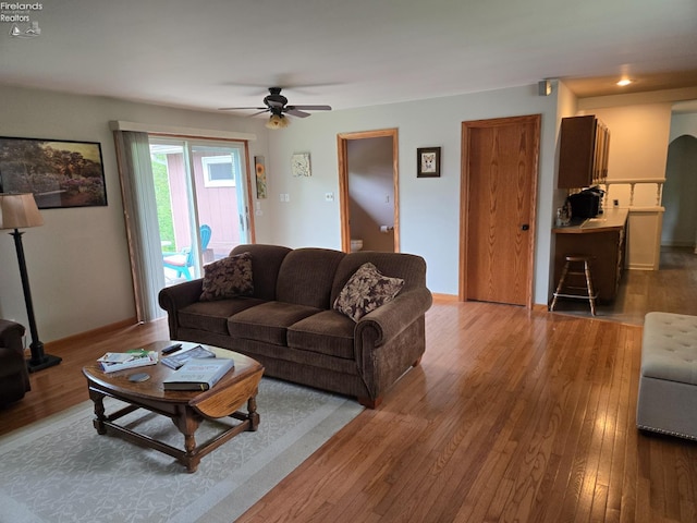 29 Scheiber St, Tiffin, OH 44883 - living room with a ceiling fan, wood finished floors, and baseboards