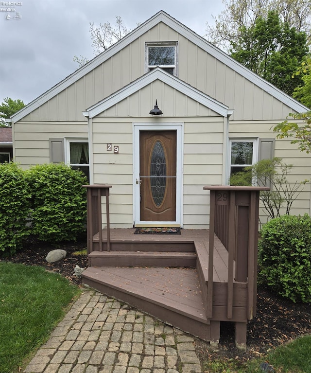 29 Scheiber St, Tiffin, OH 44883 - property entrance with board and batten siding