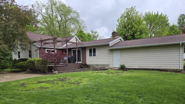 29 Scheiber St, Tiffin, OH 44883 - rear view of house featuring a lawn, a chimney, and a shingled roof
