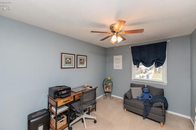 office with ceiling fan, light colored carpet, and baseboards