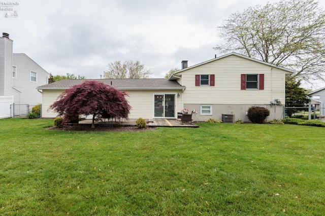 back of property with central air condition unit and a patio