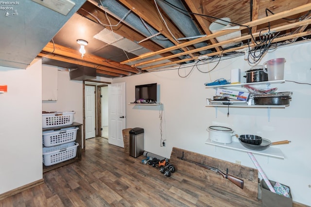 basement featuring wood finished floors
