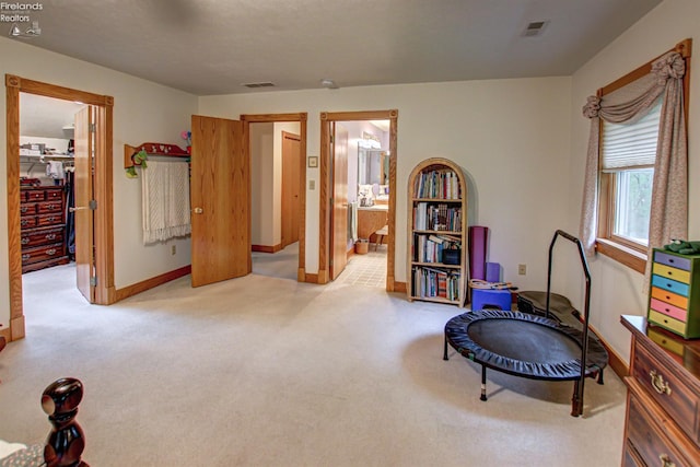914 Wood Glen Ct, Norwalk, OH 44857 - miscellaneous room with carpet floors and baseboards