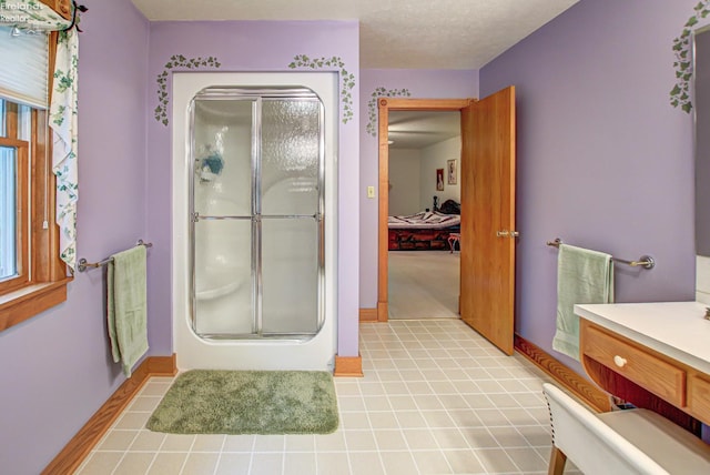 914 Wood Glen Ct, Norwalk, OH 44857 - ensuite bathroom featuring a stall shower and baseboards