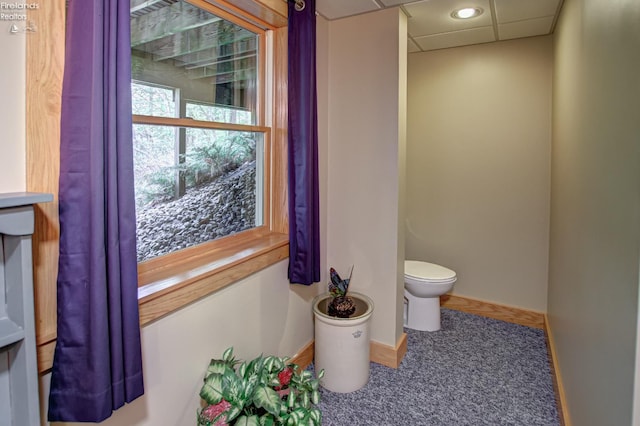 914 Wood Glen Ct, Norwalk, OH 44857 - bathroom with toilet, baseboards, and a drop ceiling