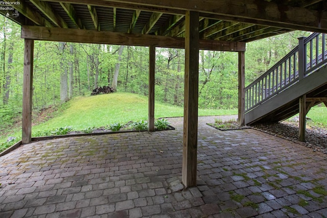 914 Wood Glen Ct, Norwalk, OH 44857 - view of patio / terrace featuring a forest view