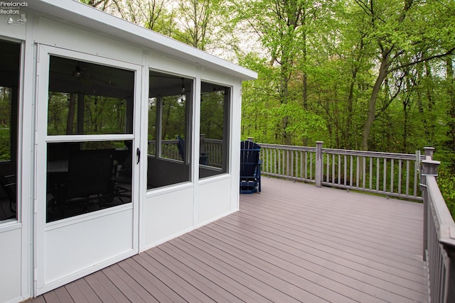 914 Wood Glen Ct, Norwalk, OH 44857 - wooden deck featuring a sunroom