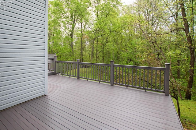 914 Wood Glen Ct, Norwalk, OH 44857 - deck featuring a view of trees