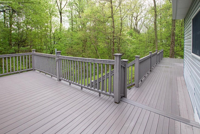 914 Wood Glen Ct, Norwalk, OH 44857 - wooden terrace featuring a view of trees