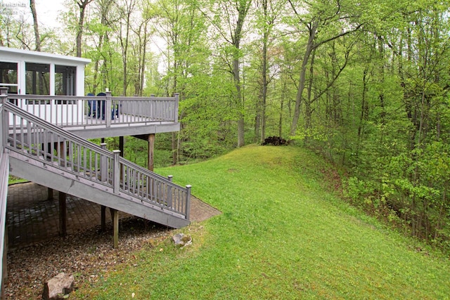914 Wood Glen Ct, Norwalk, OH 44857 - view of grassy yard featuring a wooden deck and a sunroom