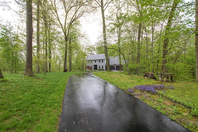 914 Wood Glen Ct, Norwalk, OH 44857 - view of front of property featuring a front lawn and asphalt driveway