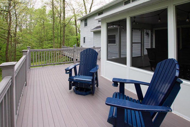 914 Wood Glen Ct, Norwalk, OH 44857 - deck featuring a sunroom