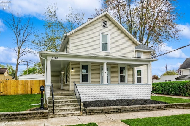 509 College Ave, Fostoria, OH 44830 - view of front of house with a porch